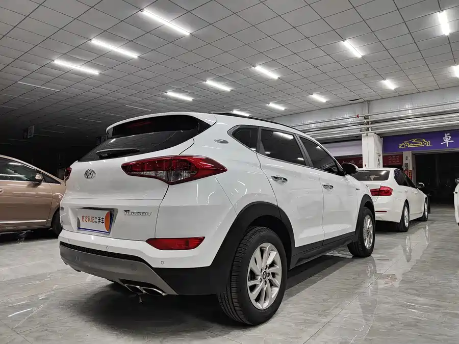 900x675_0_q87_c42_autohomecar__Chto52m79kGAals6AAaYuVk9FUE017.jpg.webp Used Hyundai Tucson 2018 1.6T dual-clutch two-wheel drive 15th anniversary special edition