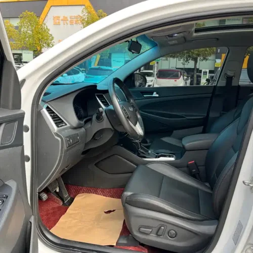 900x675_0_q87_c42_autohomecar__ChtpWGm6Q8WAE-jnAAl1gij1gr8860.jpg.webp Used Hyundai Tucson 2018 1.6T dual-clutch two-wheel drive 15th anniversary special edition