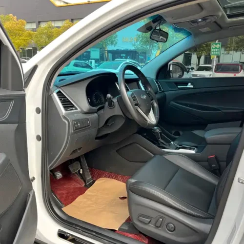 900x675_0_q87_c42_autohomecar__ChtpWGm6Q8aAI0S2AAnd7HRTVFE125.jpg.webp Used Hyundai Tucson 2018 1.6T dual-clutch two-wheel drive 15th anniversary special edition