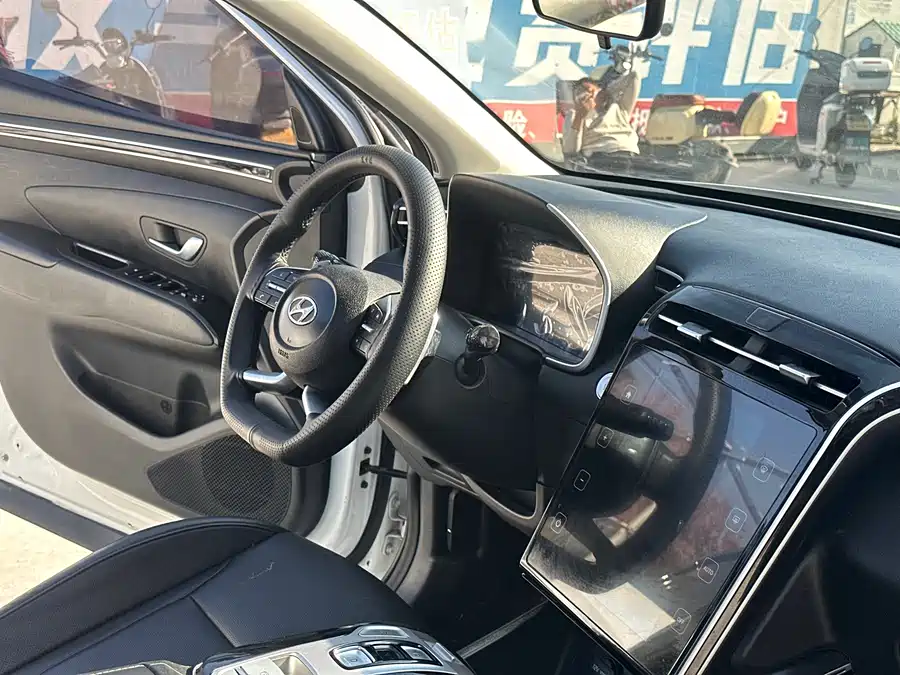 900x675_0_q87_c42_autohomecar__ChxpVWlPlqiATjE8AAsnjenAFfE298.jpg.webp Used Hyundai Tucson 2023 Used Hyundai Tucson L 1.5T automatic two-wheel drive GLX Elite Edition